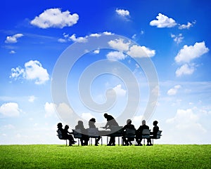 Business People Around The Table Outdoor photo