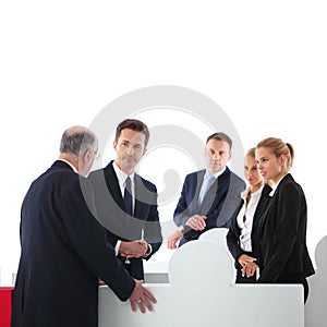 Business people assembling puzzle