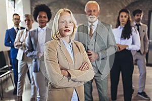 Business people with businesswoman leader on foreground