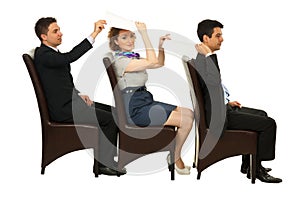 Business people on chairs gives papers