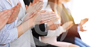 Business people clapping and applause at meeting or conference, close-up of hands. Group of unknown businessmen and