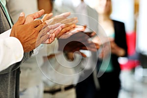 Business people clapping hand