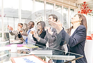 Business people clapping hands photo