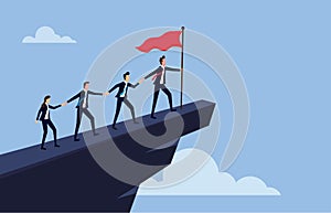 Business people climb to the top of mountain, leader helps the team to climb the cliff and reach the goal