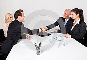 Business people closing the deal