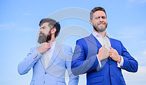 Business people concept. Well groomed appearance improves business reputation entrepreneur. Business men stand blue sky photo