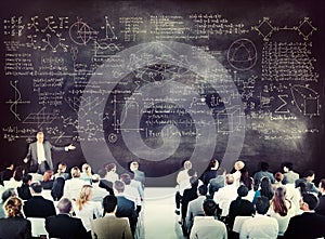 Business People on a Conference About Equations