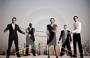 Business People Connected By Strings photo