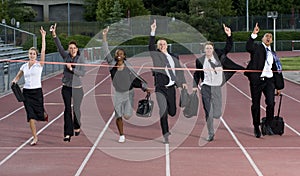 Business People Crossing the Finish Line