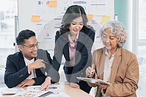 Business people discussing and brainstorming in the meeting room.