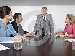 Business People Discussing In Conference Room