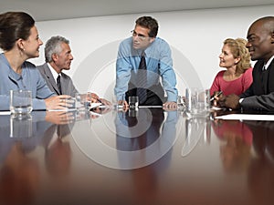 Business People Discussing In Conference Room