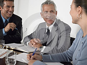 Business People Discussing At Conference Table