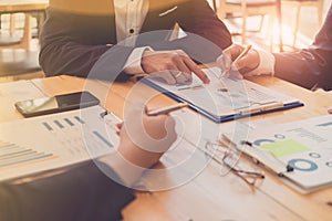 Business people discussing financial reports at meeting.board of directors planning project, considering business offer, business photo