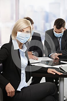 Business people fearing h1n1 virus