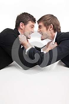 Business people fighting.