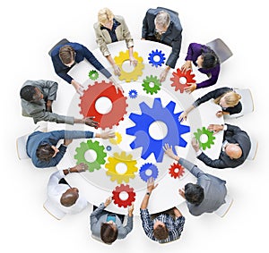 Business People with Gears and Teamwork Concept