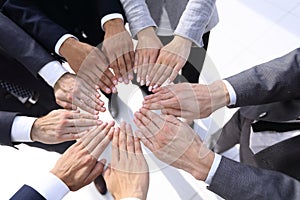 Business people giving each other their hands