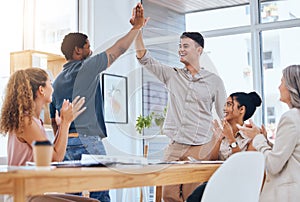 Business people giving high five for success in meeting, people clapping hands for team achievement and in celebration