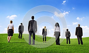 Business People in a Green Field