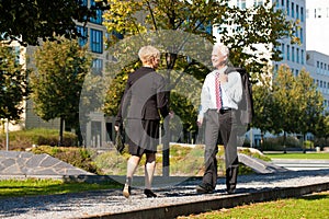 Business people greeting outdoors