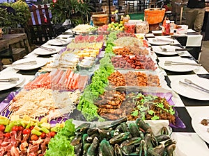 Business people group in the line catering buffet food indoor in luxury restaurant