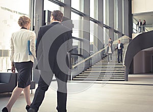 Business people at hall of office building