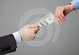 Business people hands exchanging money