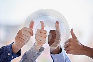 Business people, hands and thumbs up for teamwork, success and agreement with mockup space. Closeup, group and employees