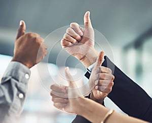 Business people, hands and thumbs up for winning, success or company goals in teamwork at office. Hand of employee group