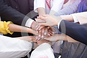 Business people hands together and teamwork concept.