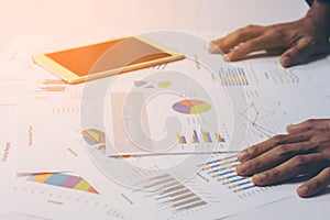 Business people hands working with a tablet on white table background