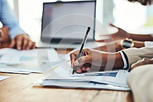 Business people, hands and writing in meeting, analytics or company statistics at the office desk. Hand of employee