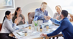 Business people, handshake and applause in meeting for hiring, b2b agreement or teamwork at office. Happy group of