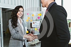 Business people handshake in corporate office