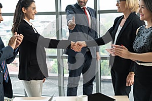 Business people handshake in corporate office