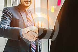 Business people handshake in corporate office