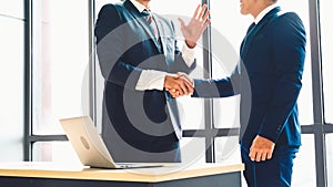 Business people handshake in corporate office