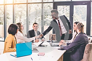 Business People Handshake Greeting Deal Concept. Young African American businessmen shaking hands during contract