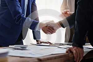 Business people handshake. Successful businessmen handshaking after good deal. Finishing up meeting concept