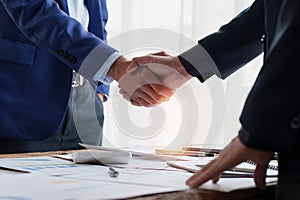 Business people handshake. Successful businessmen handshaking after good deal. Finishing up meeting concept