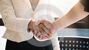 Business people handshake for teamwork of business merger and acquisition