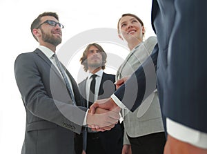 Business people handshaking after good deal.