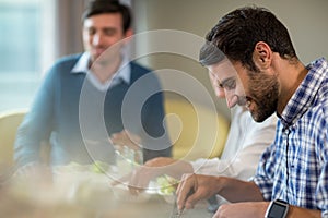 Business people having breakfast