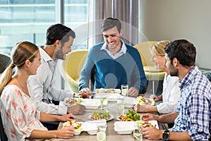 Business people having breakfast