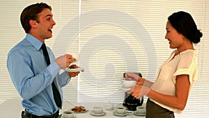 Business people having coffee in the staff room