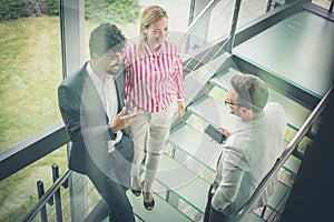 Business people having conversation in building office.