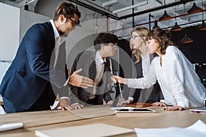 Business people having discussion, dispute or disagreement at meeting or negotiations