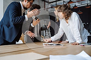 Business people having discussion, dispute or disagreement at meeting or negotiations