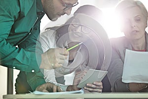 Business people having discussion at table in office